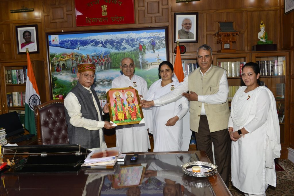 Tying Rakhi to H. E. Governor Shri Shiv Pratap Shukla at Shimla Raj Bhawan